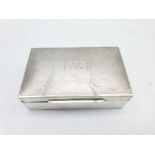 Silver cigarette box with engine turned cover engraved with initials L14cm Birmingham 1927