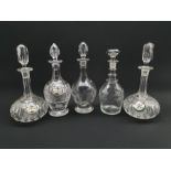 Pair of etched glass Sherry decanters with bone china labels, hobnail cut glass decanter and two oth