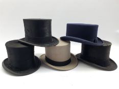 Grey top hat by Bates of London in leather case, two black top hats by Lock & Co., another by Christ