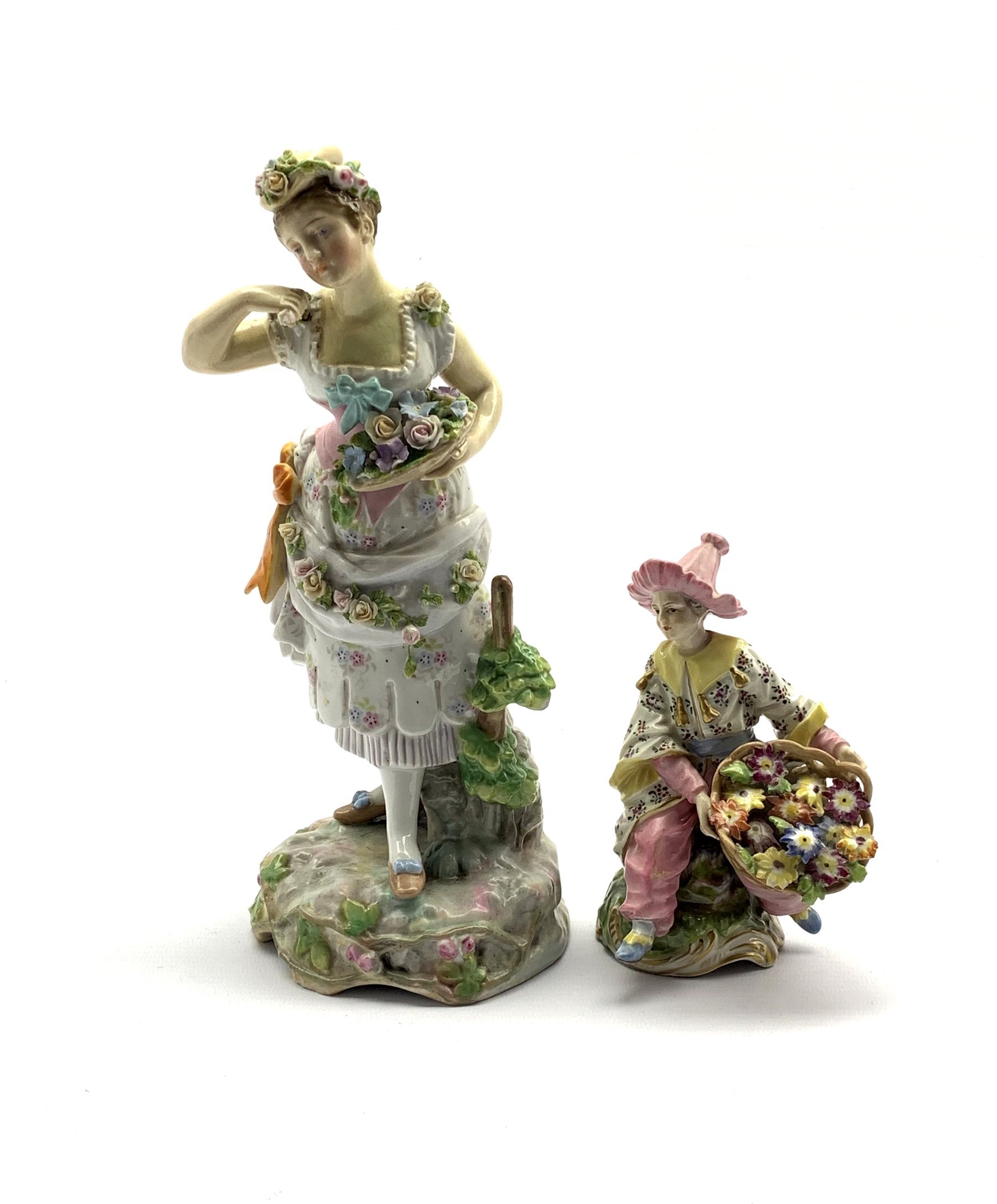 Rudolstadt female figure holding a basket of flowers H25cm and another Continental figure holding f