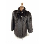 German brown mink jacket with silk pattern lining, cuffs with buttons and stand-up collar