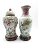 20th Century Chinese baluster vase decorated with script, birds and flowers on a wooden stand H45cm