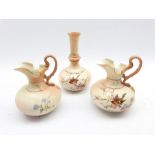 Pair of Locke and Co Worcester jugs painted with birds and flowering branches on a blush ivory groun