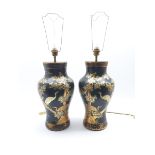 Pair of Black lacquer Chinoiserie table lamps of baluster form, decorated with scenes of deer and cr