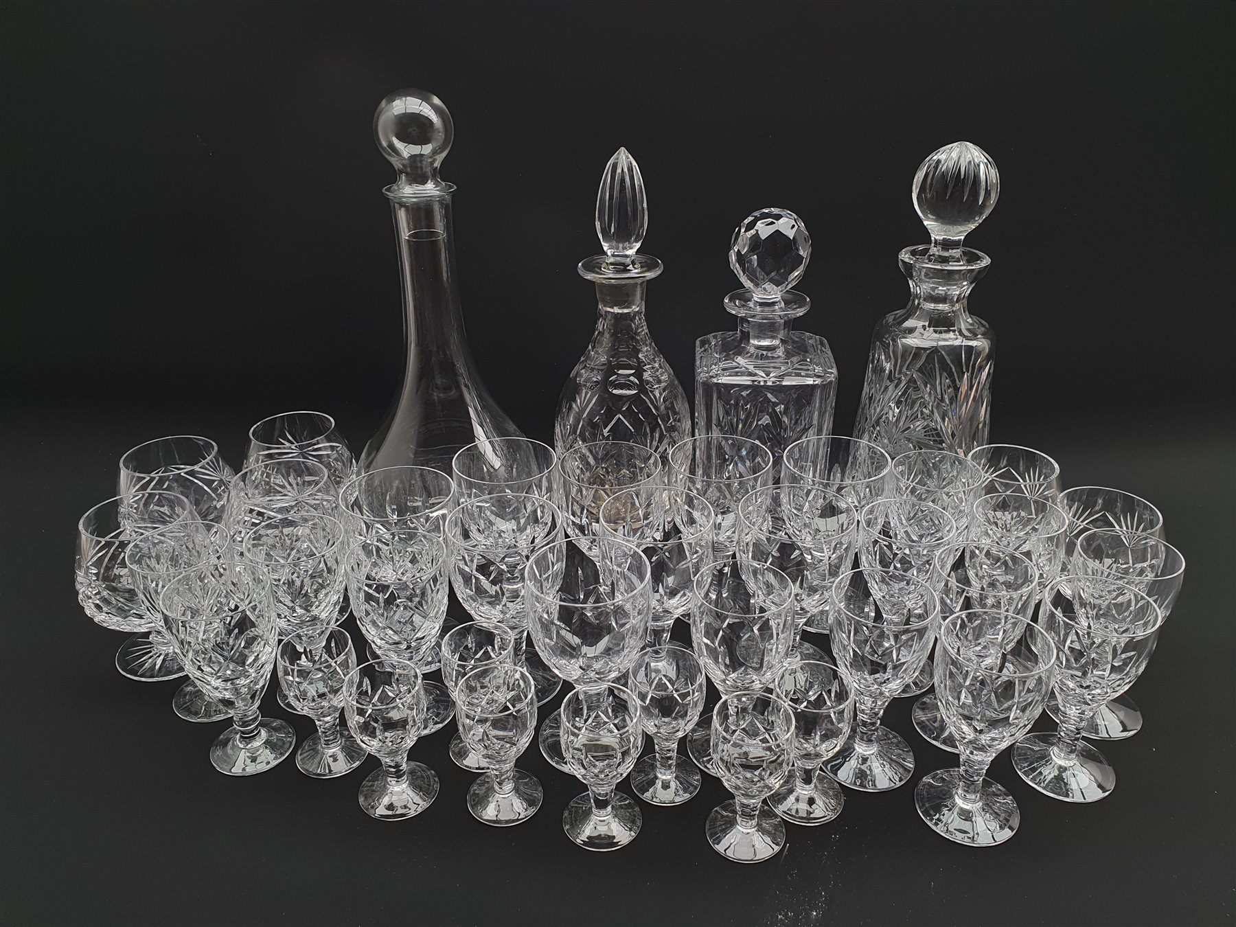 Part set of Stuart crystal table glass (25) other cut glass and four decanters