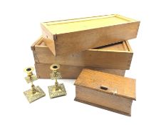 Three rectangular oak boxes with sliding tops L52cm, another oak box with hinged lid and a pair of 1