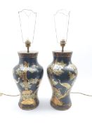 Pair of Black lacquer Chinoiserie table lamps of baluster form, decorated with scenes of deer and cr