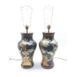 Pair of Black lacquer Chinoiserie table lamps of baluster form, decorated with scenes of deer and cr