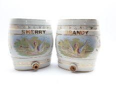 Brandy and Sherry ceramic barrel decanters with printed decoration, H32cm