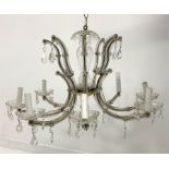 20th century eight branch glass and gilt metal chandelier with prism glass drops H44cm and a matchi