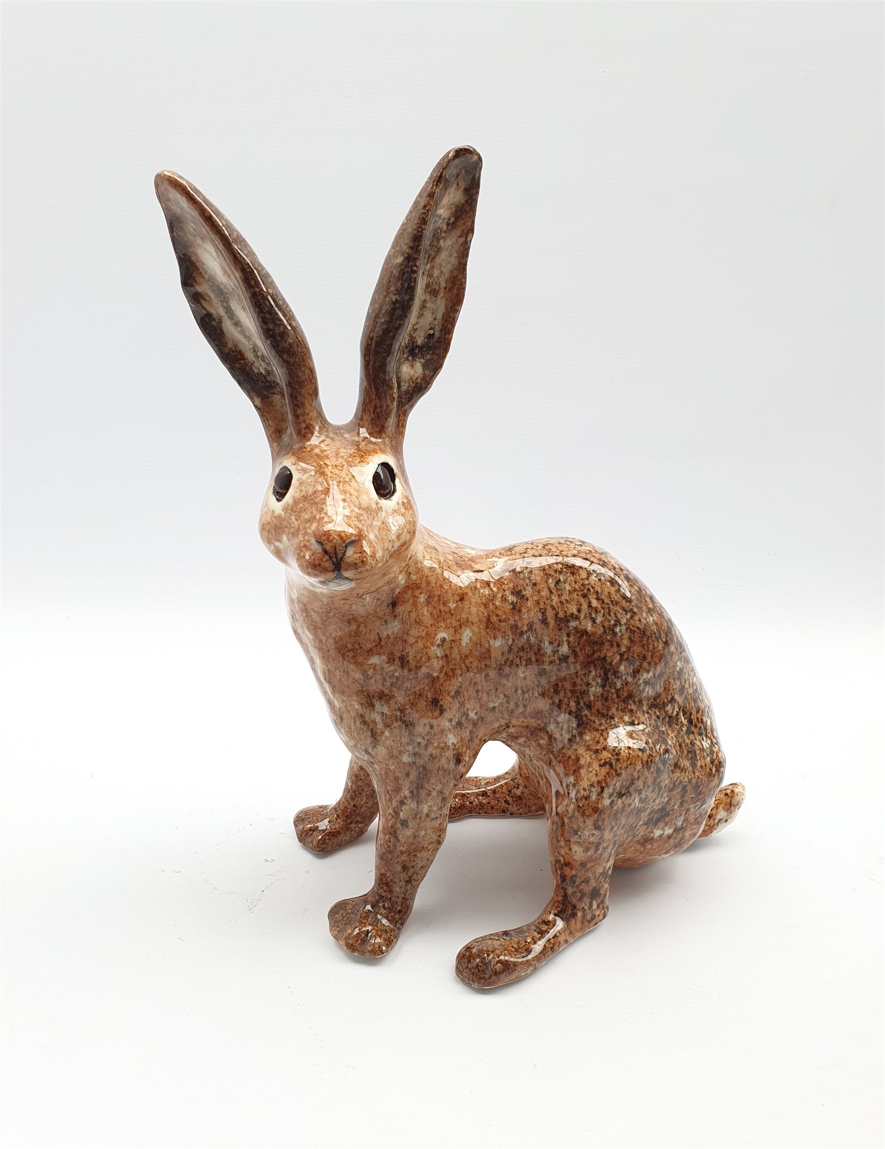 Large Winstanley Pottery brown glazed model of a Hare, H37.5cm