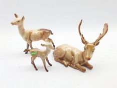 Beswick model of a Stag lying No. 954, Doe No. 999A and a Fawn No. 1000B, second version