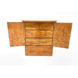 Satin walnut collectors chest, the elm interior fitted with two long and two short drawers enclosed