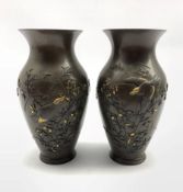 Pair of late 19th/early 20th Century Japanese bronze baluster vases with a raised pattern of birds a