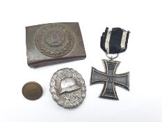 German World War I wound badge, Iron Cross dated 1914, German belt buckle and a military button