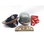 Russian military peaked cap, forage cap, beret, steel helmet and a belt