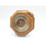 Thompson of Kilburn Mouseman barometer in octagonal oak case with carved mouse signature W20cm