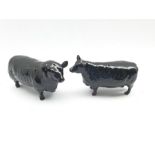 Beswick model of an Aberdeen Angus bull No. 1562 and Aberdeen Angus cow No.1563, withdrawn 1989
