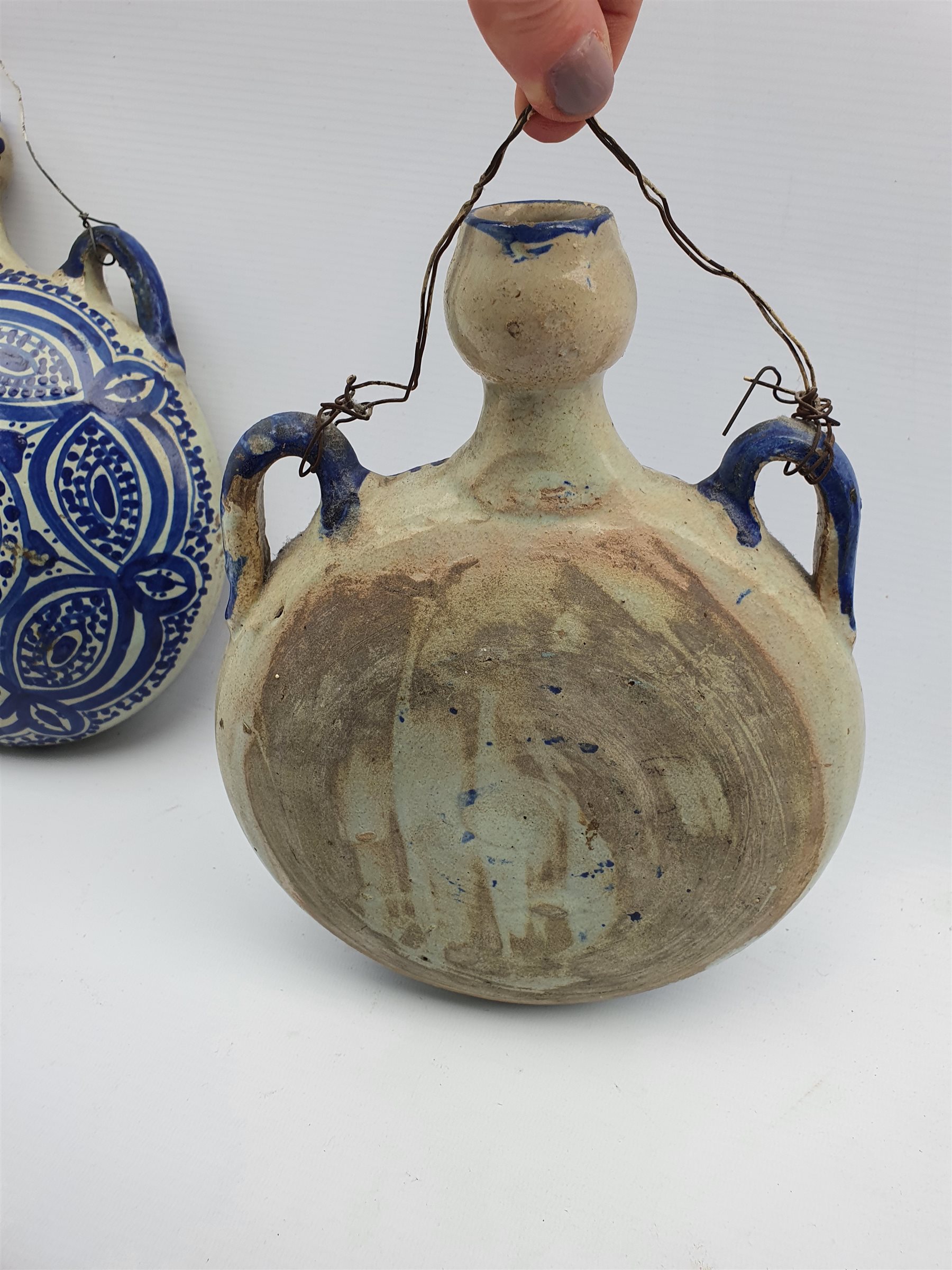 Pair of Moorish pottery flasks decorated in blue and white D18cm and a Continental blue and white mu - Image 4 of 4