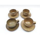 Mick Arnup (British 1923-2008): Series of four cups and saucers fired in a large oil-fired kiln with