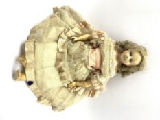 19th century wax and composite doll, wax head and limbs, inset sleeping glass eyes and blond ringlet