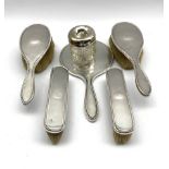 Engine turned silver five piece dressing table set Chester and Birmingham assay and a glass and silv