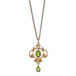 9ct gold peridot open design pendant, Sheffield 1991, on 9ct gold necklace