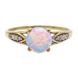 9ct gold opal ring, with cubic zironia shoulders, hallmarked
