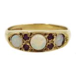 9ct gold three stone opal and four stone ruby ring, hallmarked