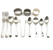 Two Georgian silver teaspoons, pair of silver sugar tongs, pair of rat tail pattern forks by Harrods
