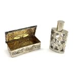 Antique design silver snuff or trinket box embossed with cherubs and scrolls and with gilded interio