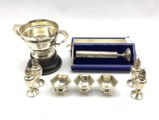 Small silver two handled trophy 'Yorkshire Automobile Club 1924', four Sterling silver pepperettes,