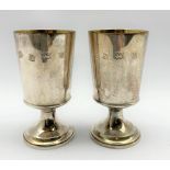 Pair of silver limited edition goblets with gilded interiors commemorating the thirteen hundredth an