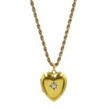 Edwardian 15ct gold old cut diamond, heart shaped locket pendant stamped, on 9ct gold rope twist nec
