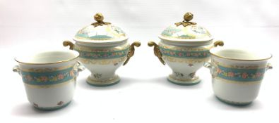 Pair of German lidded tureens and bottle coolers, each decorated with pink roses within pale blue ba
