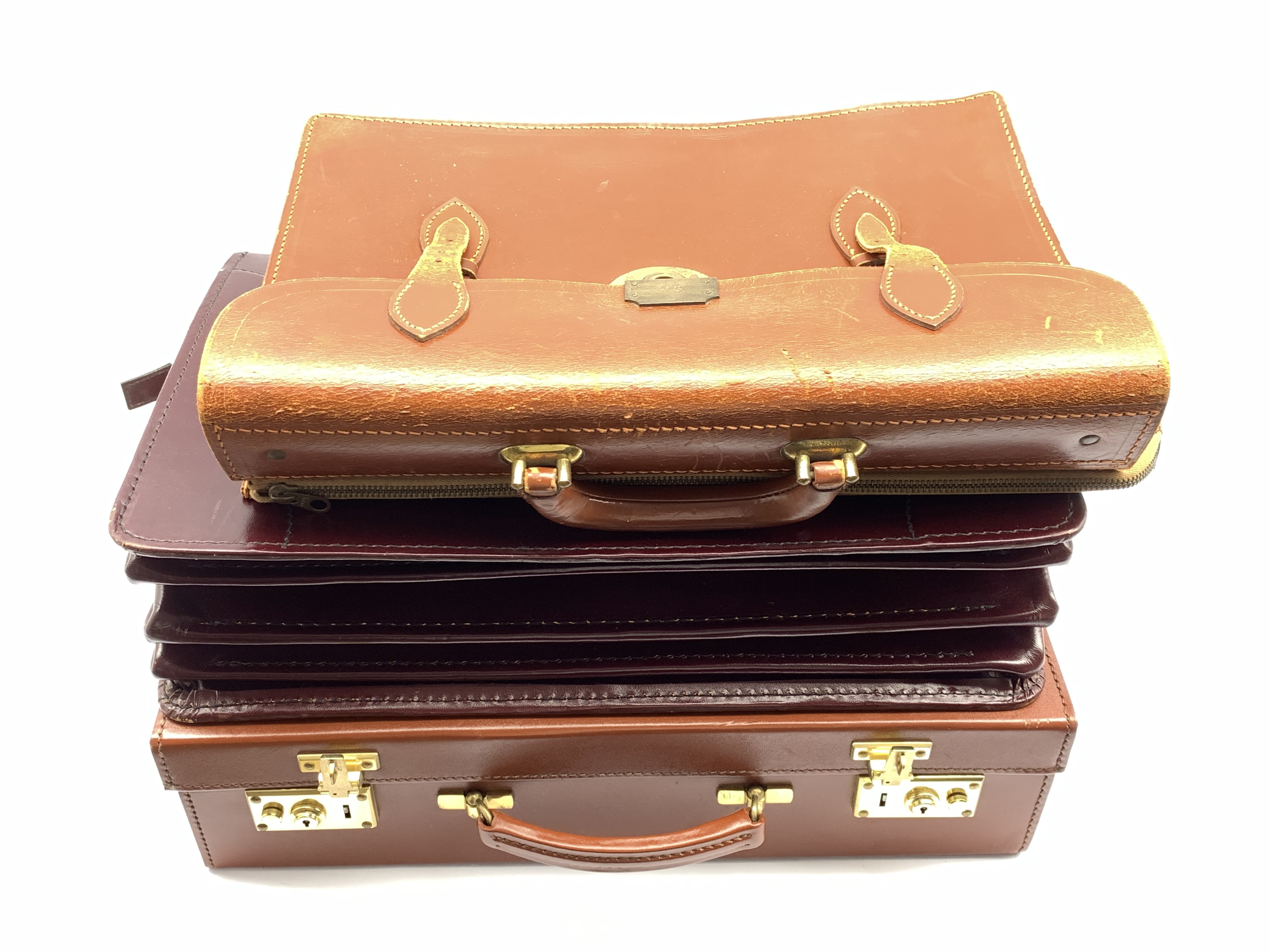 Papworth of Cambridge leather briefcase and document case, together with a Pendragon cow hide attach