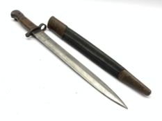 British Lee Metford bayonet stamped with various marks including EDF, with wooden mounted grip and l