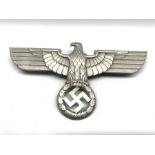 Third Reich Nazi Germany cast metal insignia, eagle with spread wings above wreath, A/F swastika det