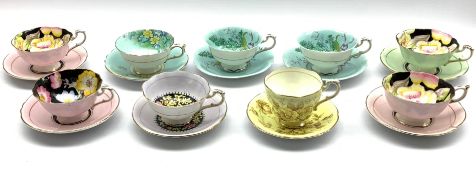 Collection of nine Paragon cups and saucers variously decorated with flowers