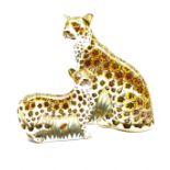 Royal Crown Derby 'Leopardess' paperweight and another 'Leopard Cub', both boxed and with gold stopp