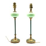 Pair of 1920s/30s brass table lamps, the slender stems with gilt etched glass globes and turquoise