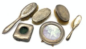 Silver circular table photograph frame Birmingham 1913, silver watch case and four various silver ba