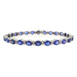 18ct white gold oval sapphire and round brilliant cut diamond bracelet, stamped 750, total sapphire