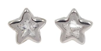 Pair of white gold cubic zirconia star stud earrings, stamped 9K