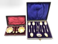 Set of six late Victorian 'Apostle' tea spoons with shell bowls, tongs and sifting spoon Birmingham