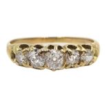 Gold graduating five stone old cut diamond ring, central diamond approx 0.20 carat