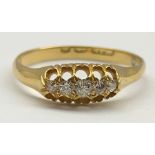 Victorian 18ct gold engagement ring with five small diamonds in an open work setting Size 'O'