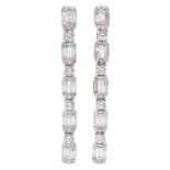 Pair of 18ct white gold baguette and round brilliant cut diamond pendant earrings, stamped K18, tota