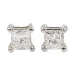 Pair of 18ct white gold princess cut diamond stud earrings, stamped 750, total diamond weight approx