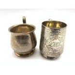 Victorian engraved silver christening mug London 1883 Maker Josiah Williams & Co and a plain silver